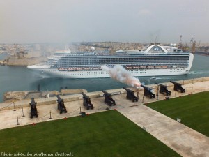 cruise liner leaving gh during noon gun salute Anthony Chetcuti