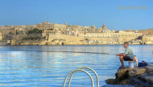 fishing at rinella in kalkara Louiseanne Delia Photography