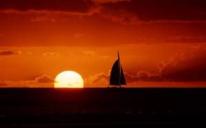 sunrise sailing boat