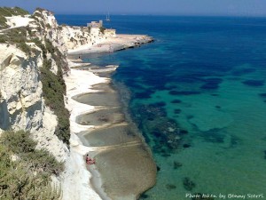 The crystal-clear sea below the beautiful white cliffs at St Thomas Bay benny scerri