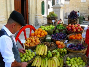 Keeping maltas traditions alive - fruit seller in rabat selling fruit the traditional way on a sunday morning alfred coppola