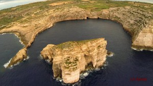 an excellent bird's-eye view of Gozo's Fungus Rock and Dwejra Bay jesmond azzopardi