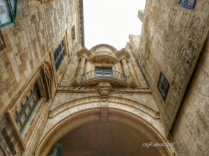 The archway between The Grand Master's Palace and the National Library. Beautiful architecture in Valletta